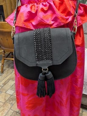 Expressions NYC Black Vegan Leather Saddle Bag - Woven Detail & Tassels